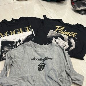 Three T-shirts two black short sleeve